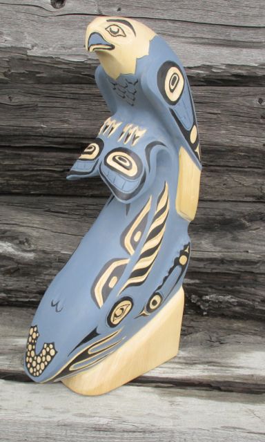 Eagle, whale, totem poles, totemic art, Alaskan Art, woodcarvings,